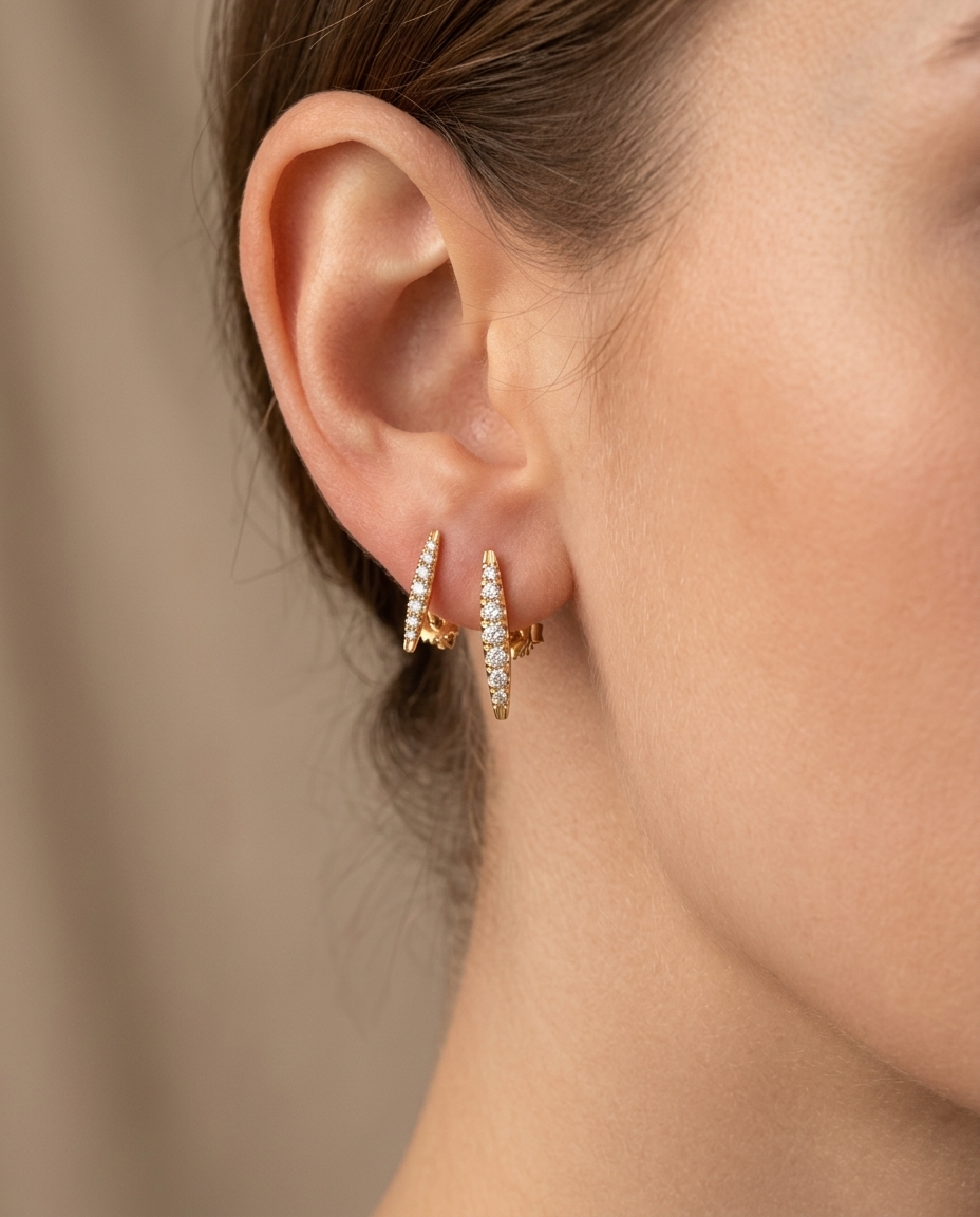 Diamond Bar Studs . in Yellow Gold on model