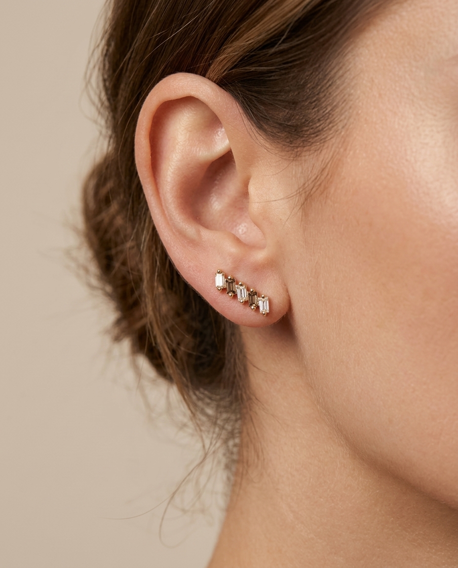 Baguette Diamond Earrings . in Yellow Gold on model