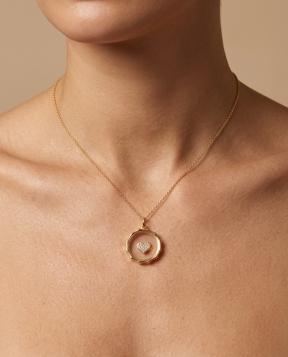 Clear Quartz Pendant with Heart in Yellow Gold on model
